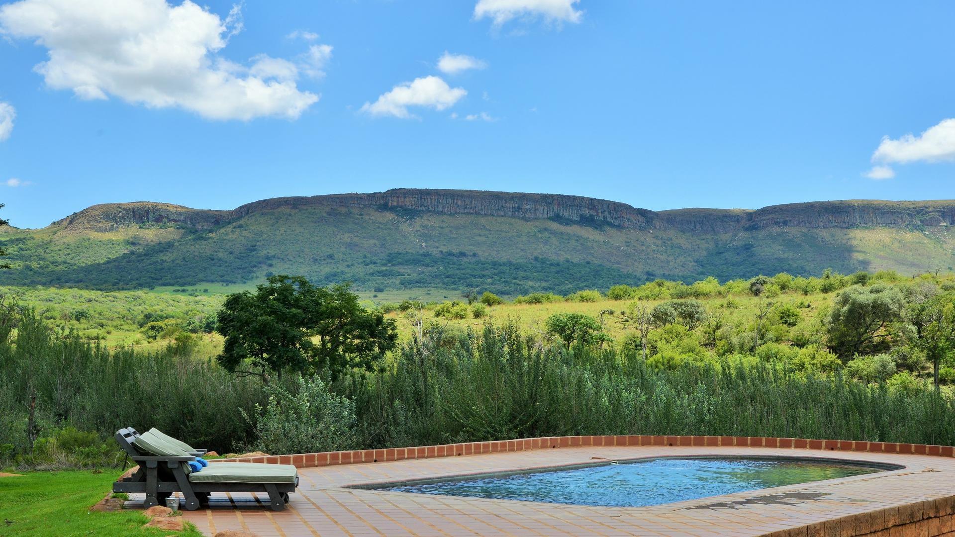 Deluxe room and pool at African Hills Safari Lodge and Spa, Magaliesberg