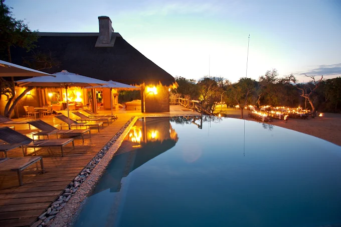 Kapama River Lodge pool and river views in the Kapama Reserve
